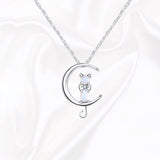 Necklace with moonstone in the shape of a crescent moon and cat